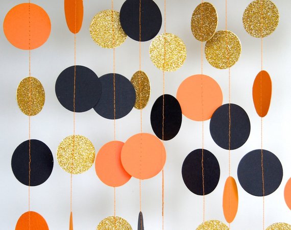 Paper Garland in Black, Orange and Gold by TheLittleThingsEV on Etsy.