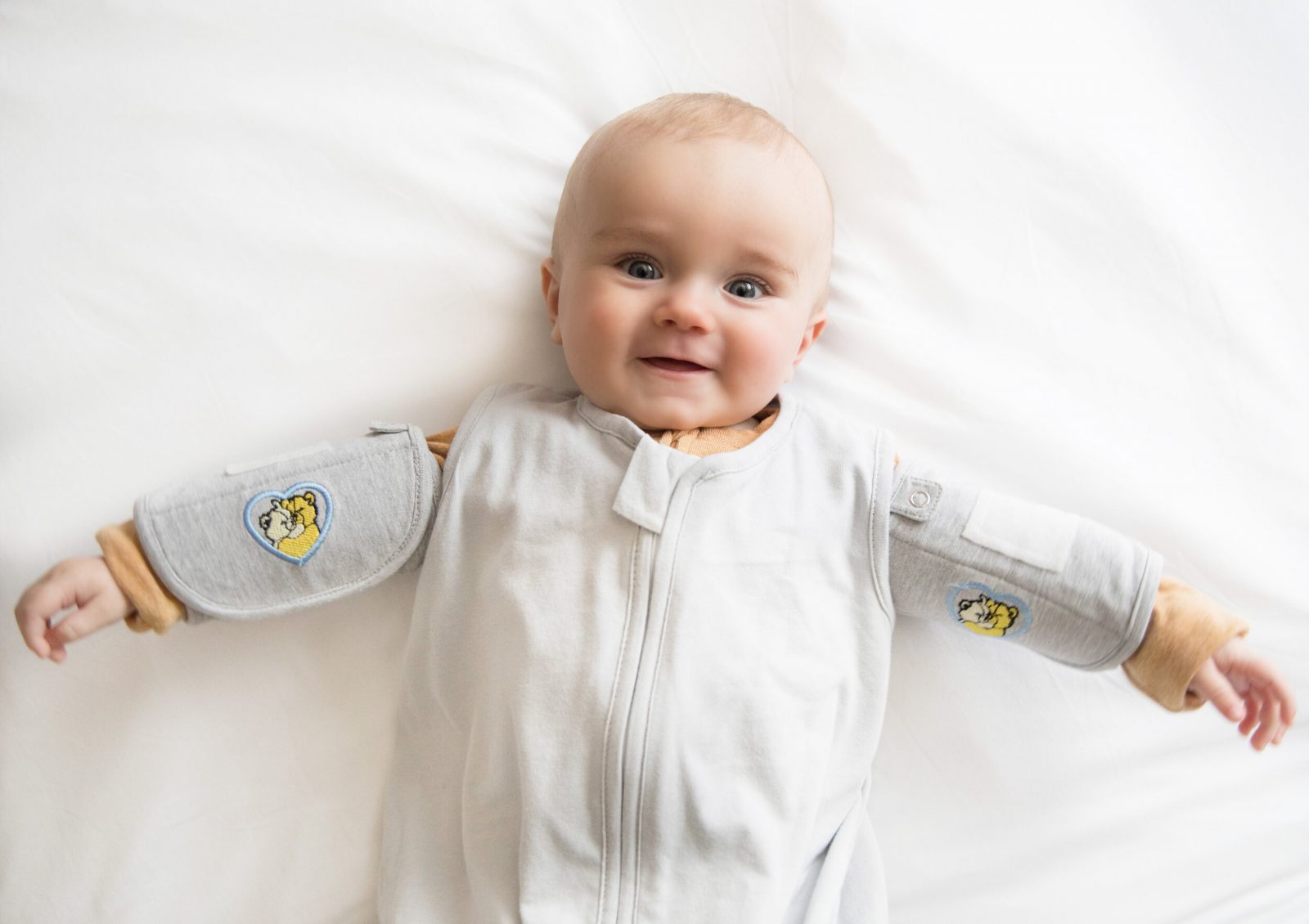 How To Transition Your Baby Out Of A Swaddle, Raise Magazine